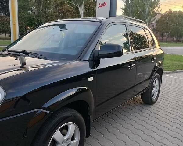 Чорний Хендай Туксон, об'ємом двигуна 1.98 л та пробігом 192 тис. км за 7950 $, фото 7 на Automoto.ua