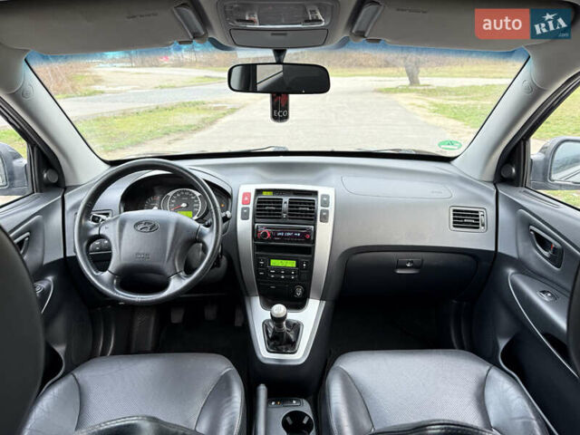 Черный Хендай Туксон, объемом двигателя 1.98 л и пробегом 159 тыс. км за 7600 $, фото 26 на Automoto.ua