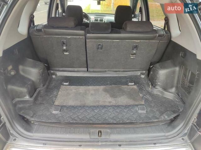 Черный Хендай Туксон, объемом двигателя 2 л и пробегом 270 тыс. км за 6800 $, фото 17 на Automoto.ua