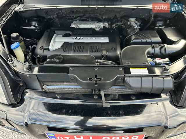 Чорний Хендай Туксон, об'ємом двигуна 2 л та пробігом 180 тис. км за 7999 $, фото 20 на Automoto.ua