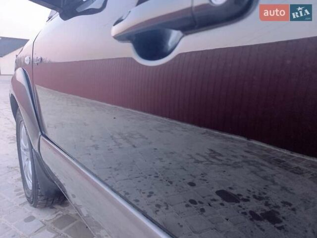 Черный Хендай Туксон, объемом двигателя 2 л и пробегом 280 тыс. км за 9500 $, фото 34 на Automoto.ua
