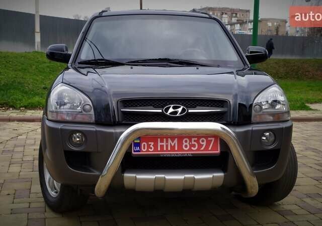 Чорний Хендай Туксон, об'ємом двигуна 2 л та пробігом 229 тис. км за 8600 $, фото 41 на Automoto.ua