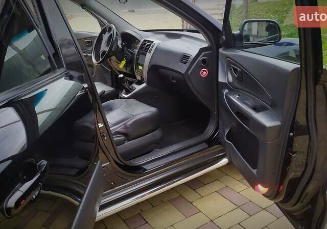 Чорний Хендай Туксон, об'ємом двигуна 2 л та пробігом 229 тис. км за 8600 $, фото 101 на Automoto.ua