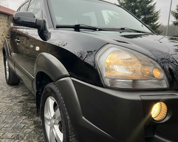 Чорний Хендай Туксон, об'ємом двигуна 1.98 л та пробігом 155 тис. км за 8750 $, фото 6 на Automoto.ua