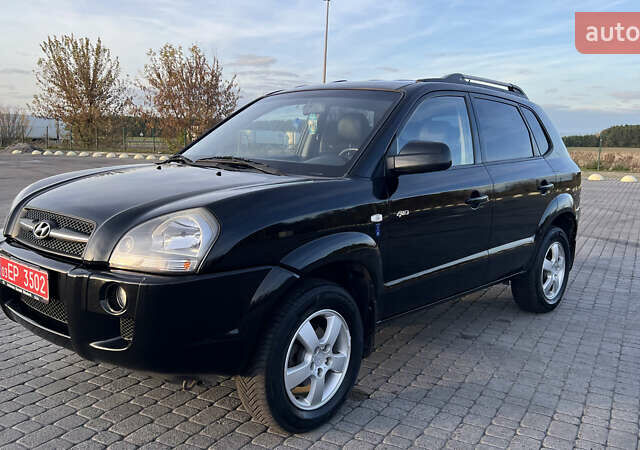 Черный Хендай Туксон, объемом двигателя 1.98 л и пробегом 243 тыс. км за 8500 $, фото 36 на Automoto.ua