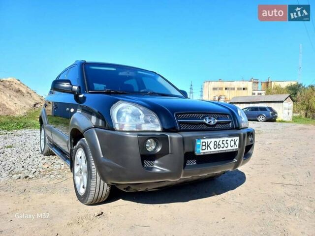 Черный Хендай Туксон, объемом двигателя 2 л и пробегом 219 тыс. км за 8500 $, фото 7 на Automoto.ua