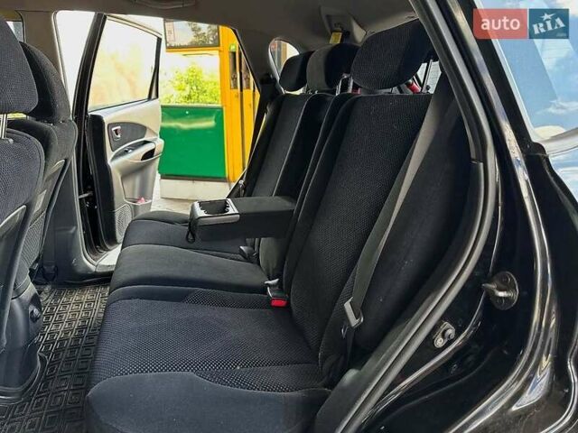 Черный Хендай Туксон, объемом двигателя 2 л и пробегом 310 тыс. км за 6499 $, фото 8 на Automoto.ua