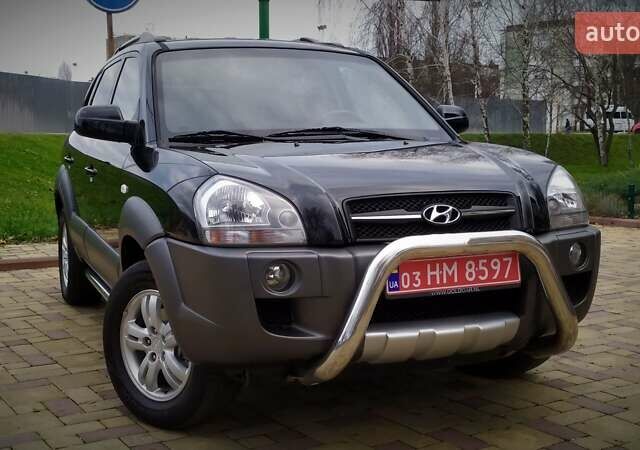 Чорний Хендай Туксон, об'ємом двигуна 2 л та пробігом 229 тис. км за 8600 $, фото 38 на Automoto.ua