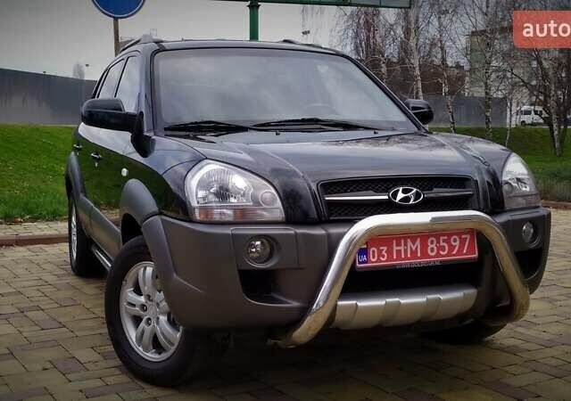 Чорний Хендай Туксон, об'ємом двигуна 2 л та пробігом 229 тис. км за 8600 $, фото 39 на Automoto.ua