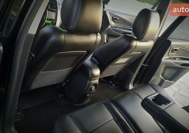 Черный Хендай Туксон, объемом двигателя 2 л и пробегом 230 тыс. км за 8600 $, фото 192 на Automoto.ua