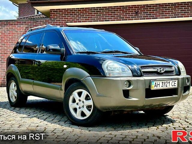 Черный Хендай Туксон, объемом двигателя 2 л и пробегом 212 тыс. км за 9000 $, фото 10 на Automoto.ua