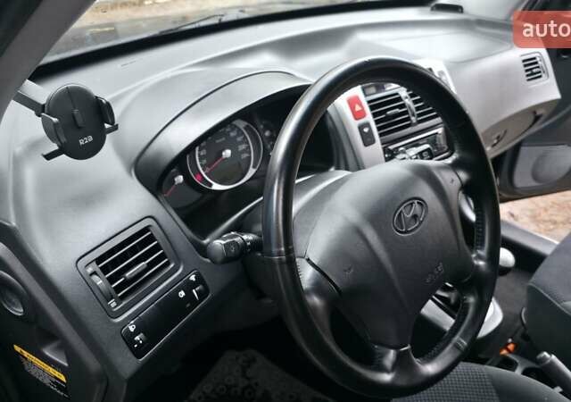 Чорний Хендай Туксон, об'ємом двигуна 2 л та пробігом 207 тис. км за 8200 $, фото 30 на Automoto.ua