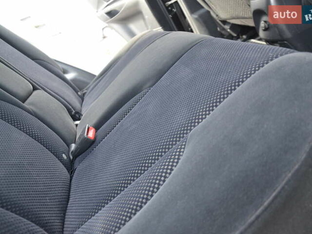 Черный Хендай Туксон, объемом двигателя 2 л и пробегом 183 тыс. км за 9150 $, фото 47 на Automoto.ua