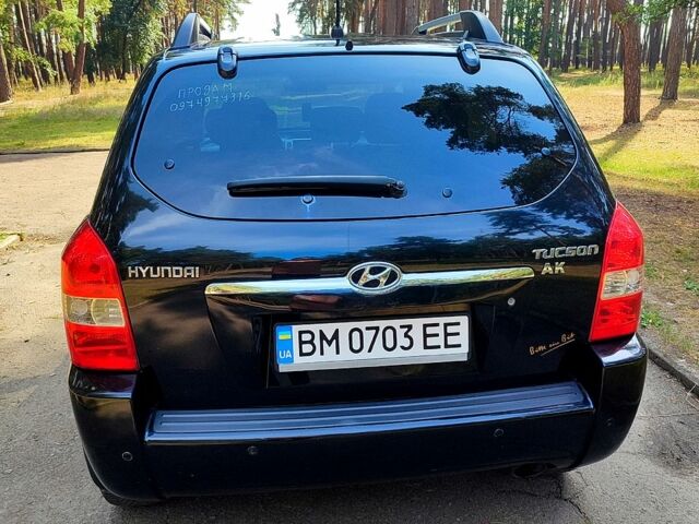 Черный Хендай Туксон, объемом двигателя 2 л и пробегом 270 тыс. км за 7800 $, фото 3 на Automoto.ua