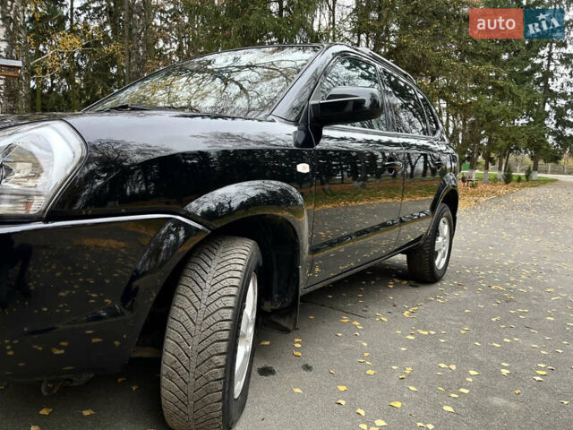 Черный Хендай Туксон, объемом двигателя 1.98 л и пробегом 99 тыс. км за 8999 $, фото 7 на Automoto.ua