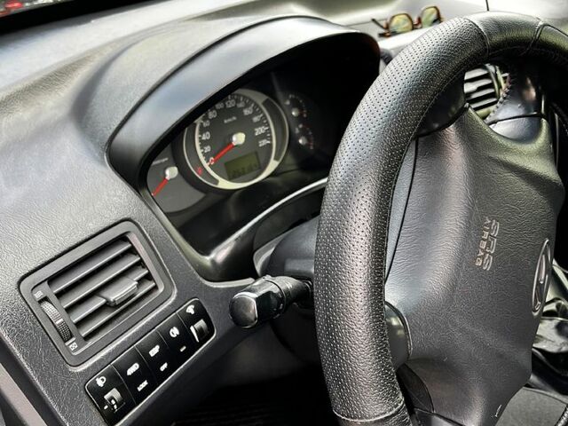 Чорний Хендай Туксон, об'ємом двигуна 2 л та пробігом 240 тис. км за 8600 $, фото 9 на Automoto.ua