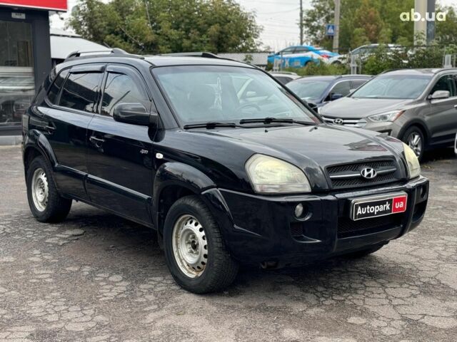 Черный Хендай Туксон, объемом двигателя 2 л и пробегом 177 тыс. км за 8940 $, фото 2 на Automoto.ua