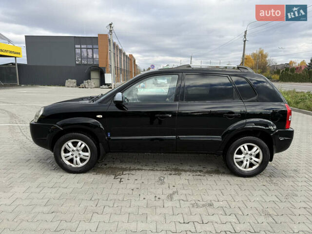 Черный Хендай Туксон, объемом двигателя 2 л и пробегом 182 тыс. км за 6999 $, фото 2 на Automoto.ua