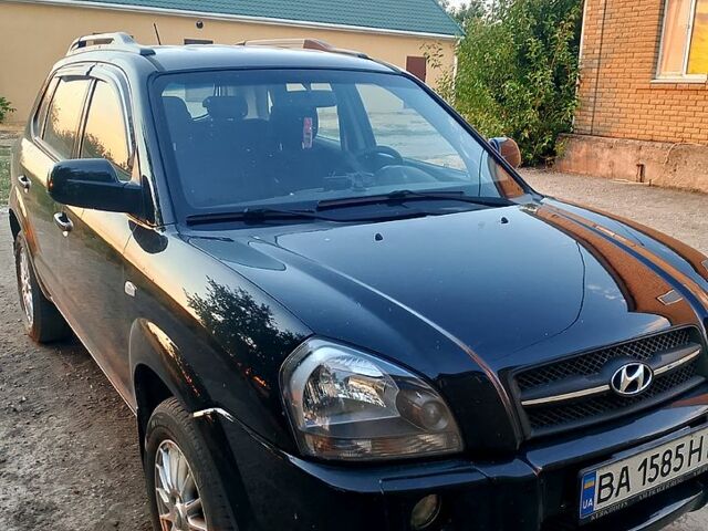 Черный Хендай Туксон, объемом двигателя 2 л и пробегом 183 тыс. км за 7900 $, фото 8 на Automoto.ua