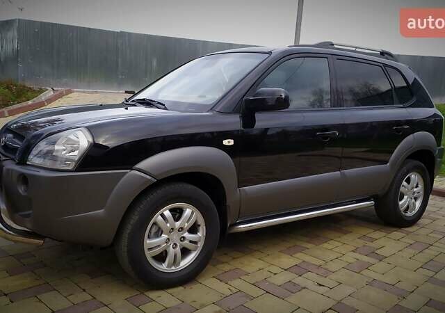 Чорний Хендай Туксон, об'ємом двигуна 2 л та пробігом 229 тис. км за 8600 $, фото 27 на Automoto.ua