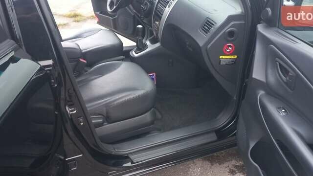 Черный Хендай Туксон, объемом двигателя 1.98 л и пробегом 155 тыс. км за 7999 $, фото 36 на Automoto.ua