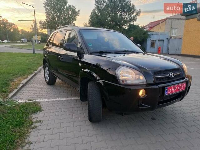 Чорний Хендай Туксон, об'ємом двигуна 1.98 л та пробігом 192 тис. км за 7950 $, фото 1 на Automoto.ua