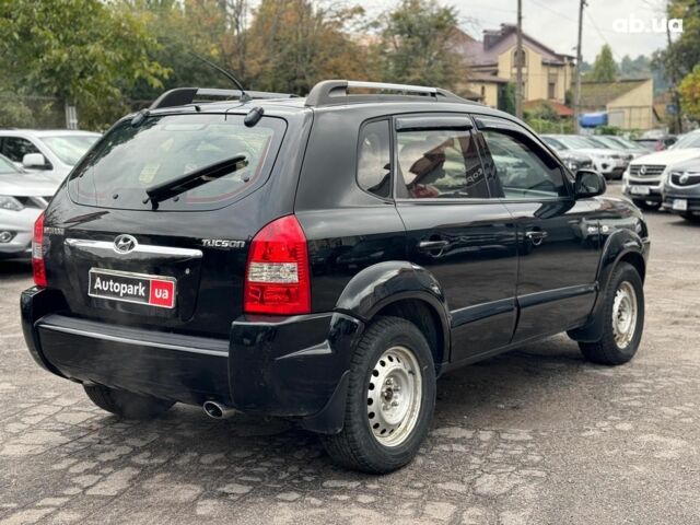 Черный Хендай Туксон, объемом двигателя 2 л и пробегом 177 тыс. км за 8940 $, фото 5 на Automoto.ua