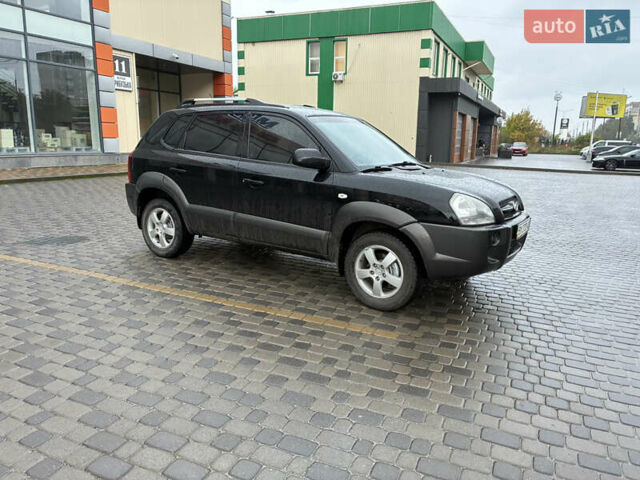 Черный Хендай Туксон, объемом двигателя 2 л и пробегом 176 тыс. км за 7450 $, фото 7 на Automoto.ua