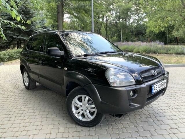 Черный Хендай Туксон, объемом двигателя 2 л и пробегом 208 тыс. км за 8100 $, фото 1 на Automoto.ua