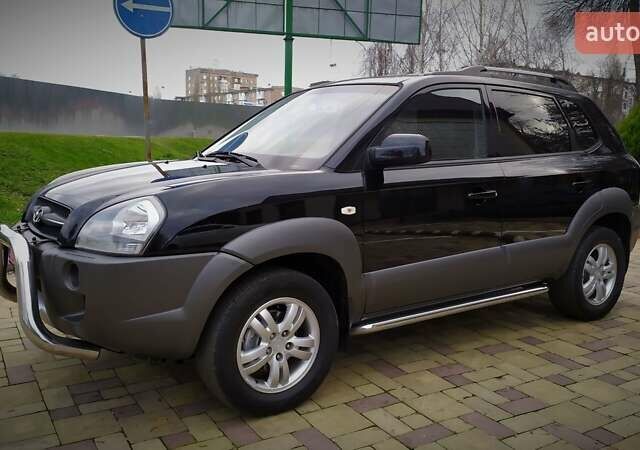 Чорний Хендай Туксон, об'ємом двигуна 2 л та пробігом 229 тис. км за 8600 $, фото 15 на Automoto.ua