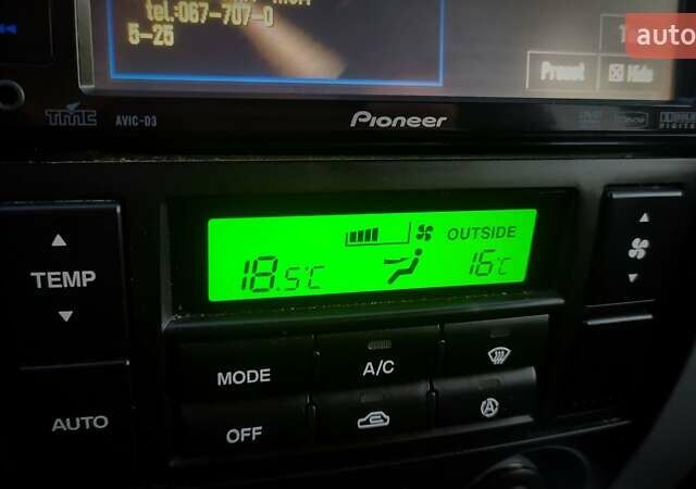 Черный Хендай Туксон, объемом двигателя 2 л и пробегом 230 тыс. км за 8600 $, фото 208 на Automoto.ua