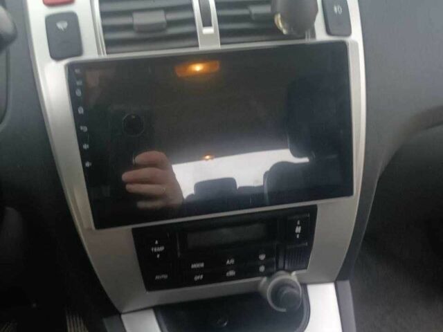 Черный Хендай Туксон, объемом двигателя 2 л и пробегом 200 тыс. км за 8300 $, фото 6 на Automoto.ua