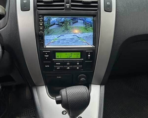 Черный Хендай Туксон, объемом двигателя 1.98 л и пробегом 147 тыс. км за 8000 $, фото 29 на Automoto.ua