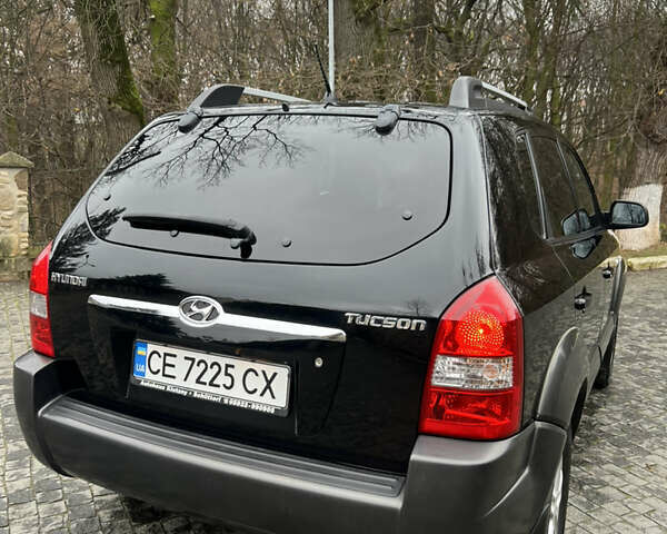 Чорний Хендай Туксон, об'ємом двигуна 1.98 л та пробігом 155 тис. км за 8750 $, фото 3 на Automoto.ua