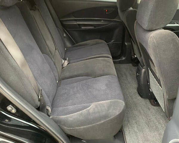 Черный Хендай Туксон, объемом двигателя 2 л и пробегом 219 тыс. км за 8600 $, фото 17 на Automoto.ua