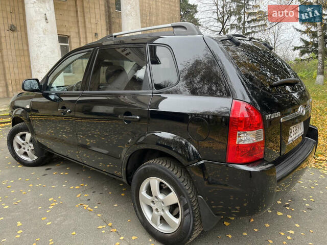 Черный Хендай Туксон, объемом двигателя 1.98 л и пробегом 99 тыс. км за 8999 $, фото 10 на Automoto.ua