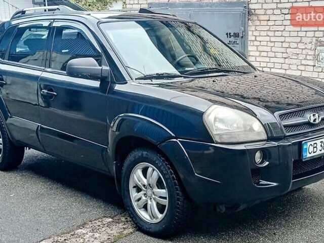Чорний Хендай Туксон, об'ємом двигуна 2 л та пробігом 308 тис. км за 7555 $, фото 1 на Automoto.ua