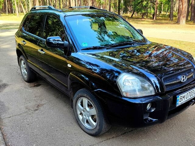 Черный Хендай Туксон, объемом двигателя 2 л и пробегом 270 тыс. км за 7800 $, фото 2 на Automoto.ua