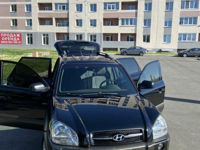 Черный Хендай Туксон, объемом двигателя 2 л и пробегом 186 тыс. км за 8000 $, фото 6 на Automoto.ua