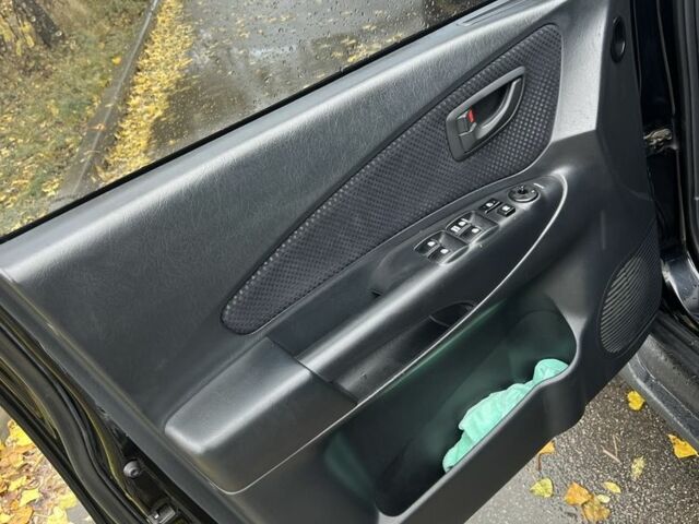 Хендай Туксон 2007 у Кам'янське (Дніпродзержинськ) на Automoto.ua Чорний Хендай Туксон, об'ємом двигуна 2 л та пробігом 162 тис. км за 7999 $, фото 9 на Automoto.ua