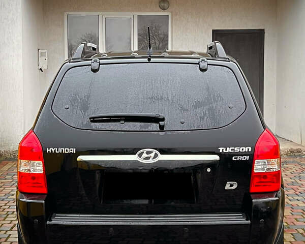 Черный Хендай Туксон, объемом двигателя 2 л и пробегом 151 тыс. км за 9100 $, фото 40 на Automoto.ua