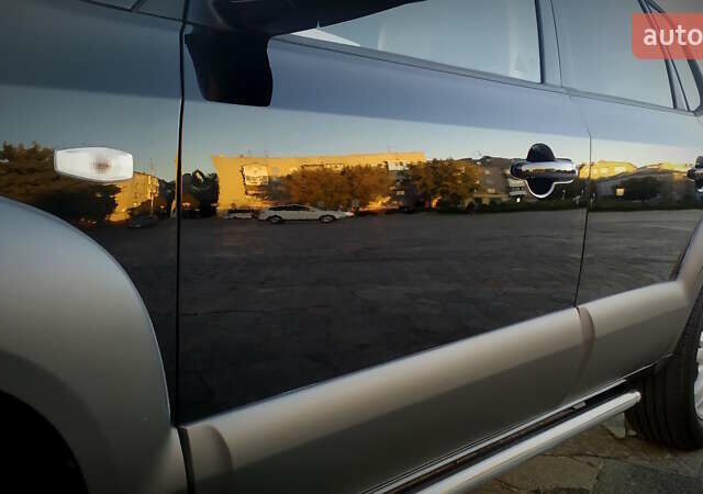 Черный Хендай Туксон, объемом двигателя 2 л и пробегом 230 тыс. км за 8600 $, фото 82 на Automoto.ua