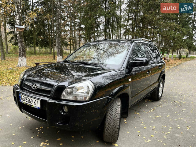 Черный Хендай Туксон, объемом двигателя 1.98 л и пробегом 99 тыс. км за 8999 $, фото 2 на Automoto.ua