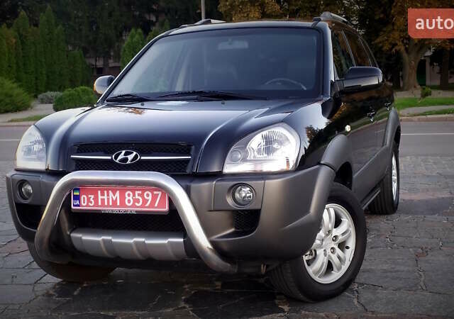 Черный Хендай Туксон, объемом двигателя 2 л и пробегом 230 тыс. км за 8600 $, фото 84 на Automoto.ua