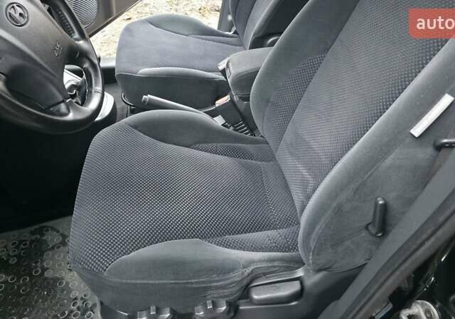 Чорний Хендай Туксон, об'ємом двигуна 2 л та пробігом 207 тис. км за 8200 $, фото 29 на Automoto.ua