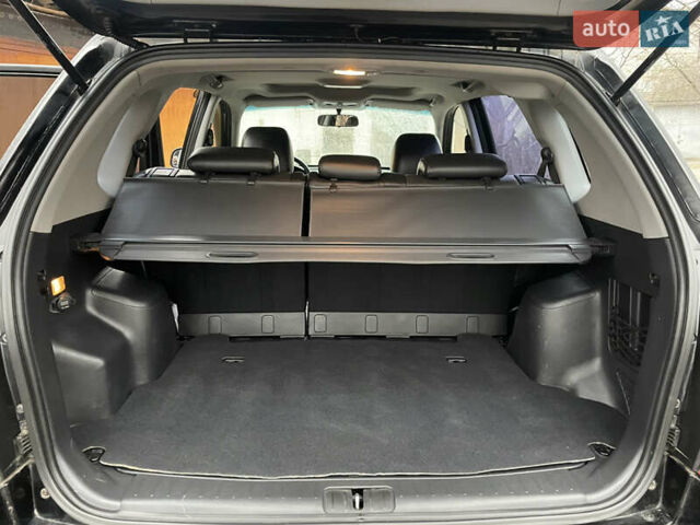 Черный Хендай Туксон, объемом двигателя 2 л и пробегом 180 тыс. км за 7700 $, фото 25 на Automoto.ua