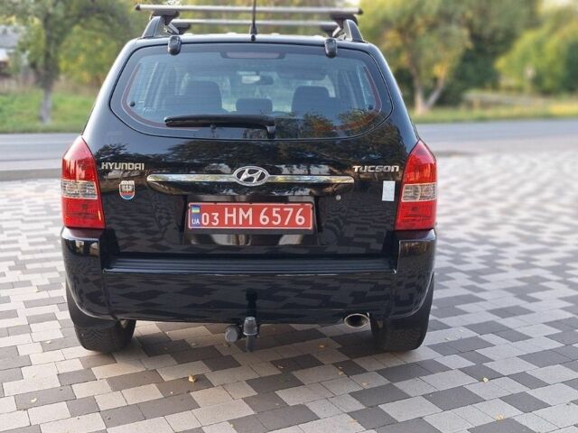 Чорний Хендай Туксон, об'ємом двигуна 2 л та пробігом 190 тис. км за 8300 $, фото 7 на Automoto.ua
