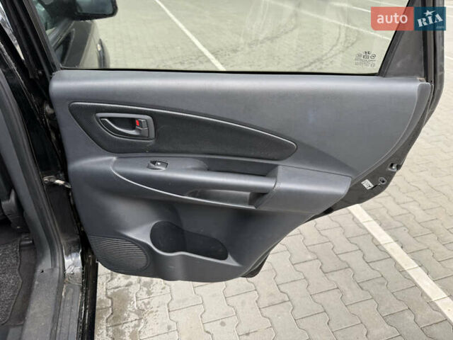 Черный Хендай Туксон, объемом двигателя 2 л и пробегом 182 тыс. км за 6999 $, фото 14 на Automoto.ua