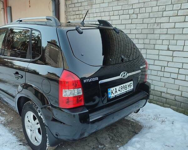 Черный Хендай Туксон, объемом двигателя 1.98 л и пробегом 335 тыс. км за 7800 $, фото 19 на Automoto.ua