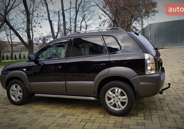 Чорний Хендай Туксон, об'ємом двигуна 2 л та пробігом 229 тис. км за 8600 $, фото 32 на Automoto.ua
